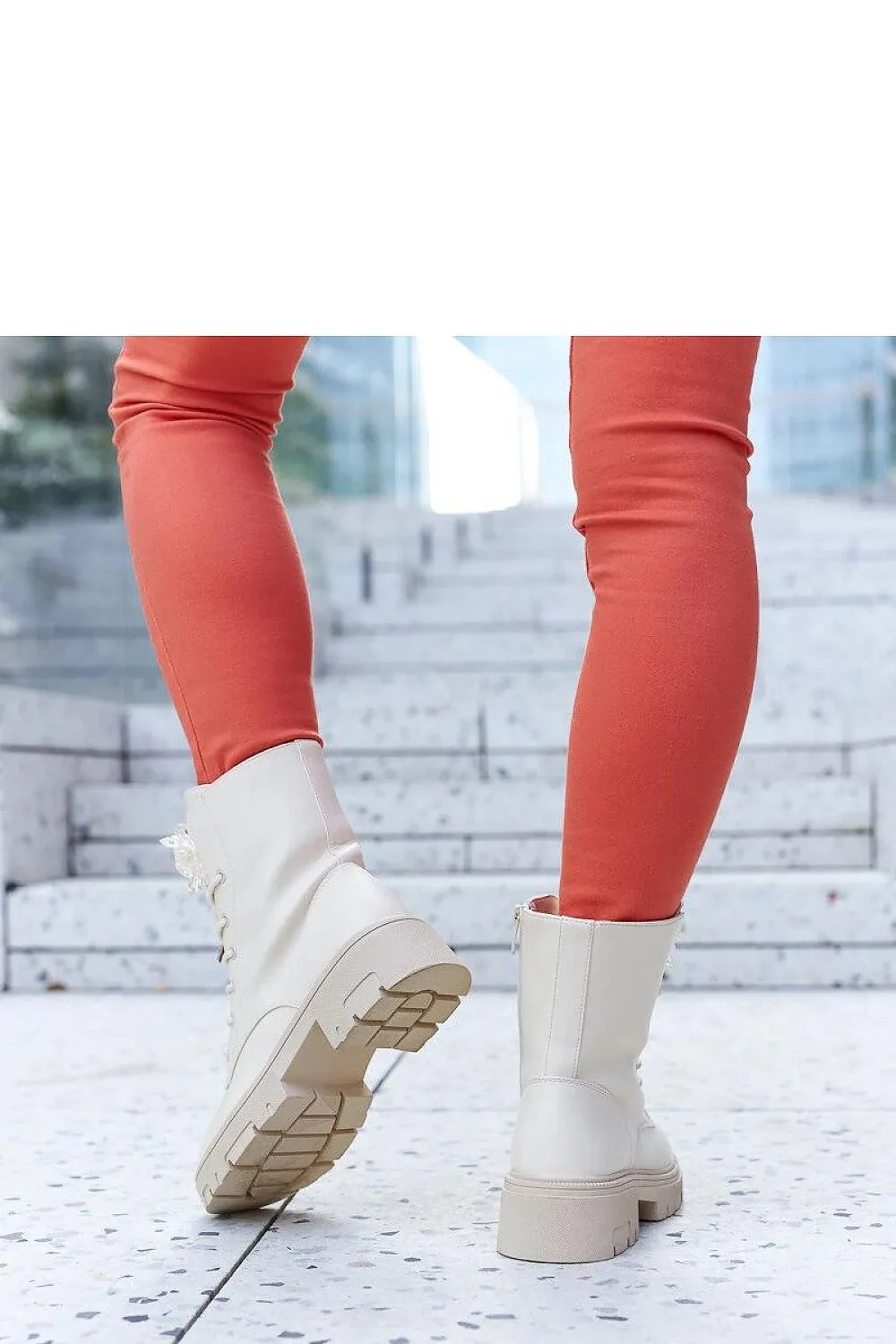 Beige boots with decorative beads