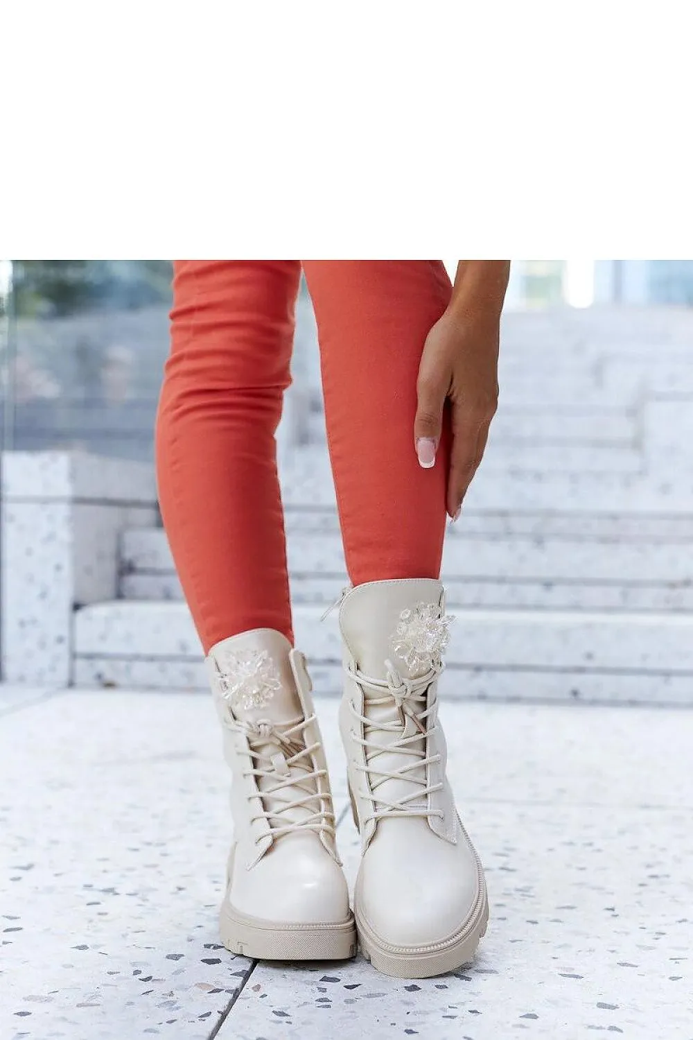 Beige boots with decorative beads