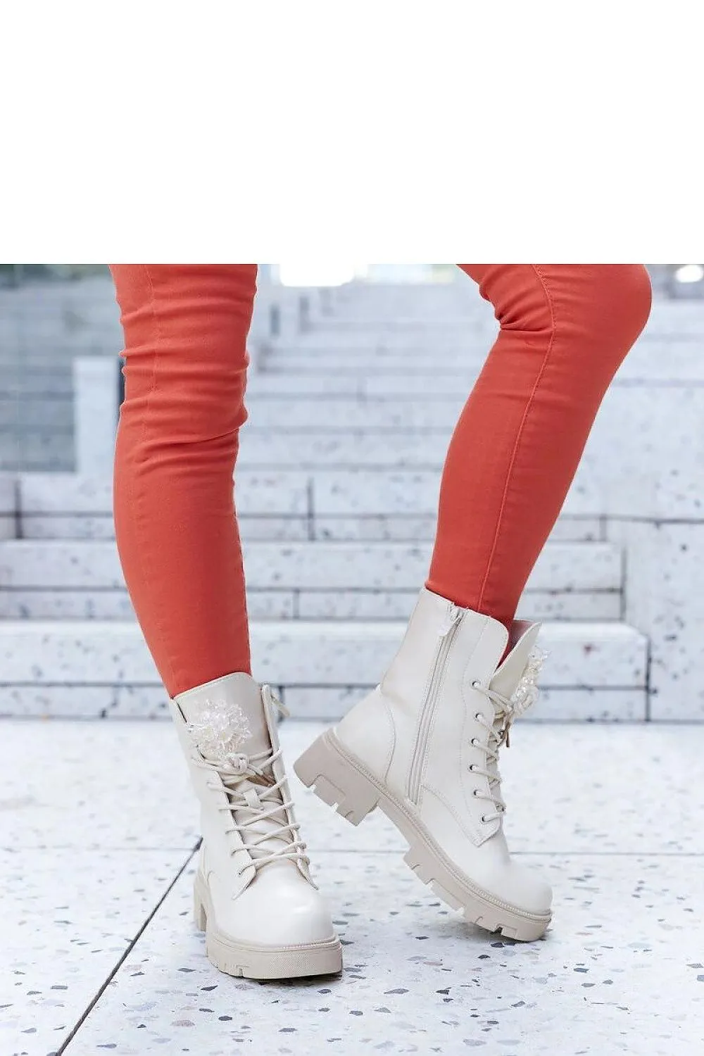 Beige boots with decorative beads