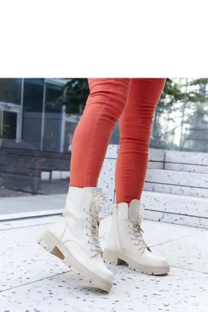 Beige boots with decorative beads